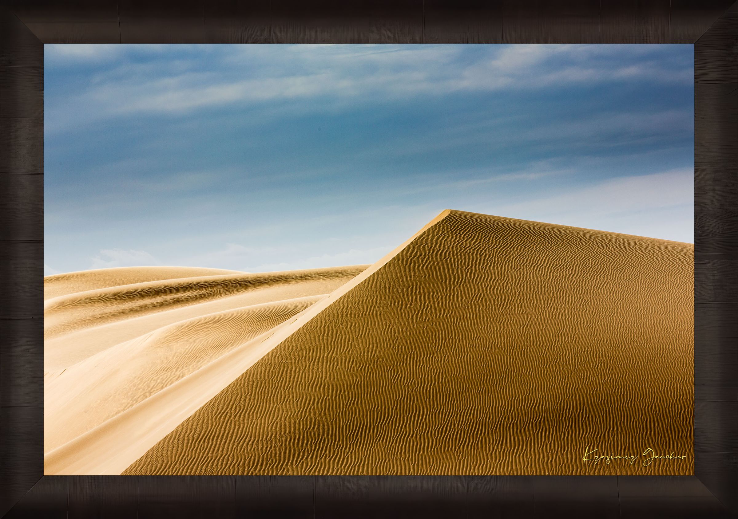 Expansive sand dune terrain at Brawley with subtle textures and color variations from natural sunlight. #Finish_Roma Dark Ash Frame
