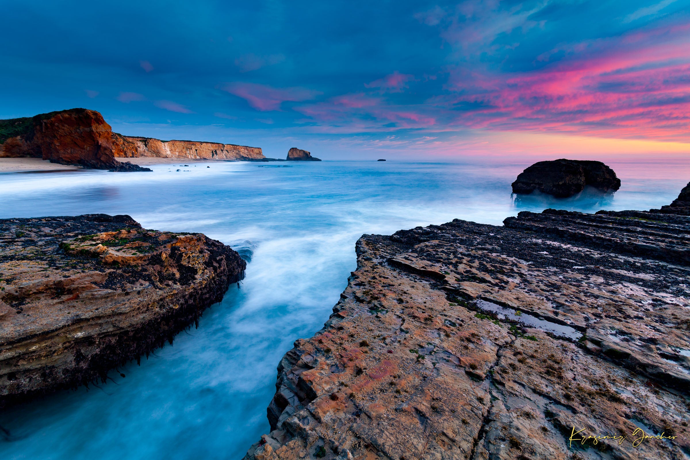 Sunset at Panther Beach, Santa Cruz featuring cliffs and waves beneath colorful clouds. #Finish_Acrylic Recess