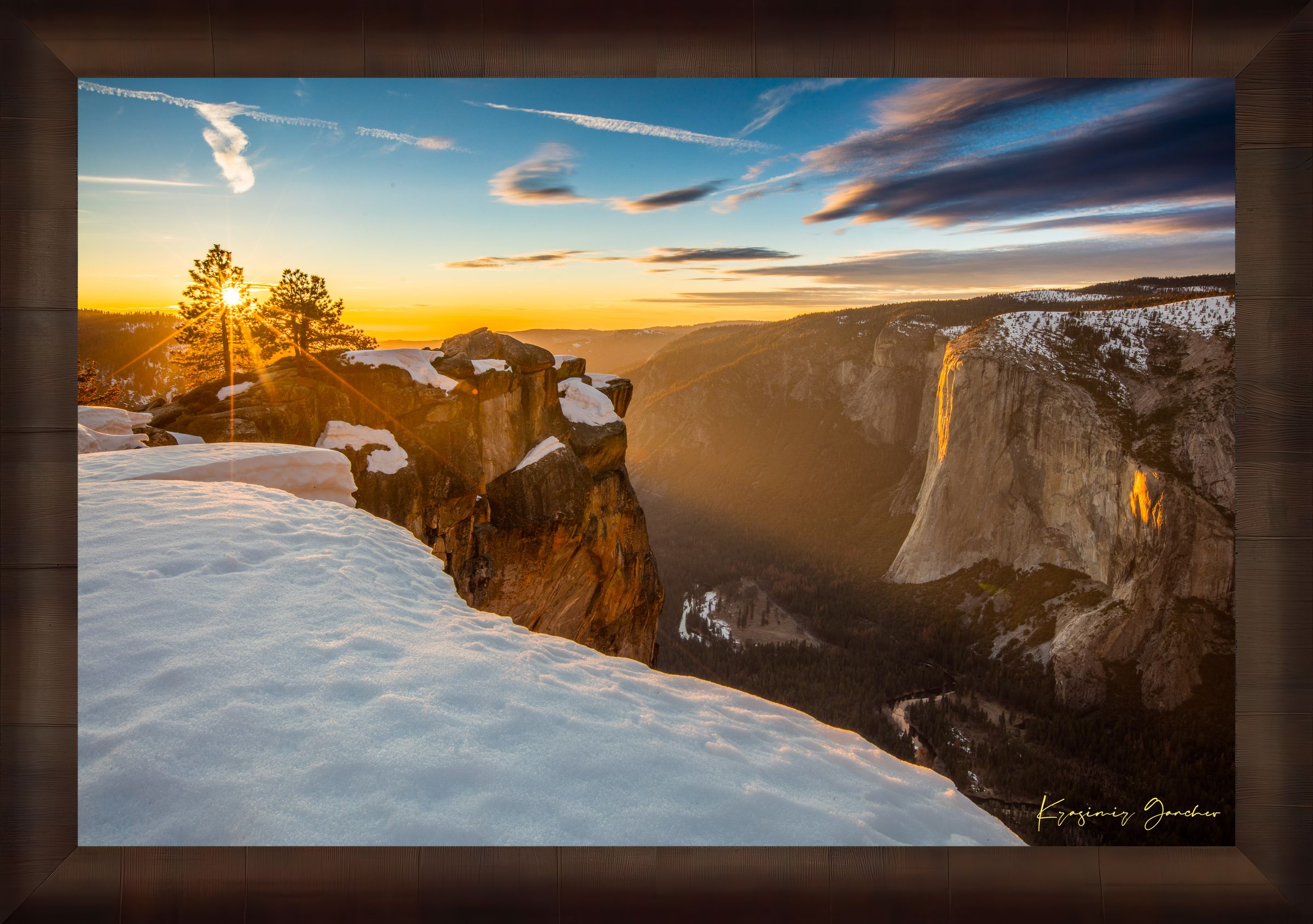 Alpine summit of El Capitan in Yosemite National Park at dawn, golden light through rock fissures over a snowfield. #Finish_Roma Cigar Leaf Frame