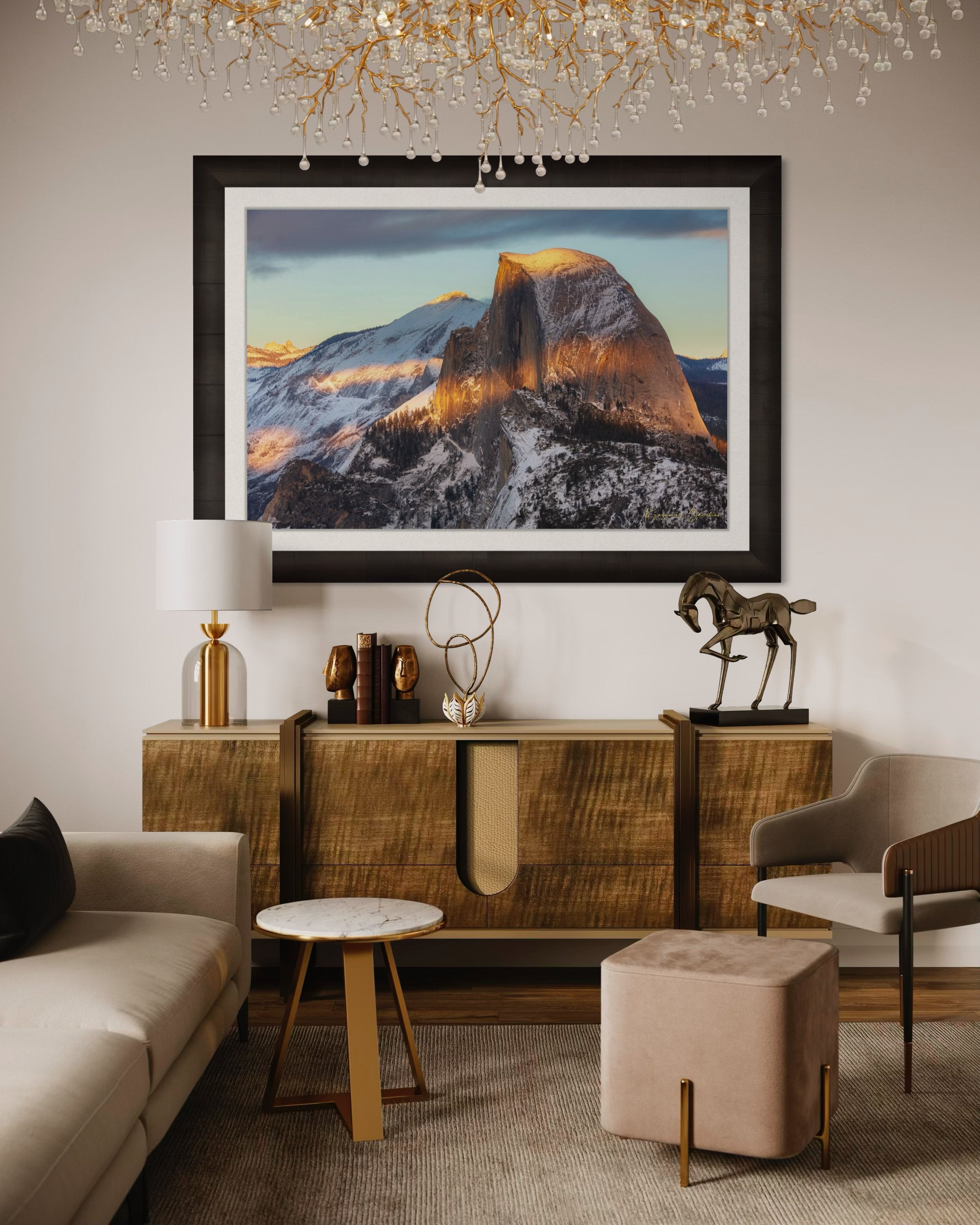Half Dome monolith illuminated by golden sunset light amidst snow-covered peaks and clouds in Yosemite National Park. #Finish_Roma Dark Ash Frame & Bright Liner