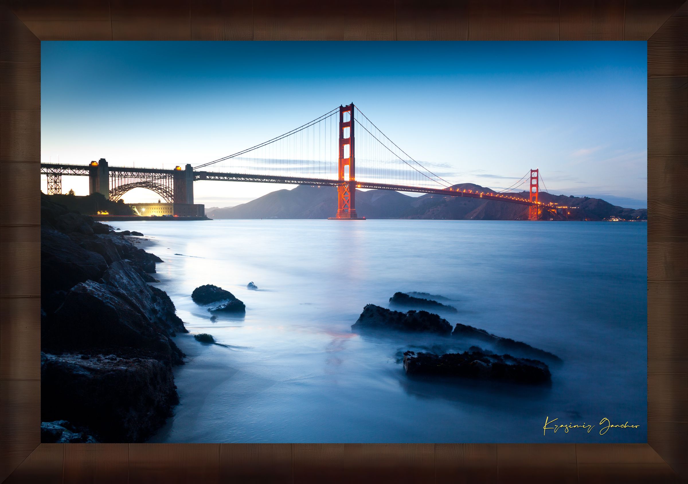 Golden Gate Bridge at dusk overlooking San Francisco Bay with calm water reflecting the sky. #Finish_Roma Cigar Leaf Frame