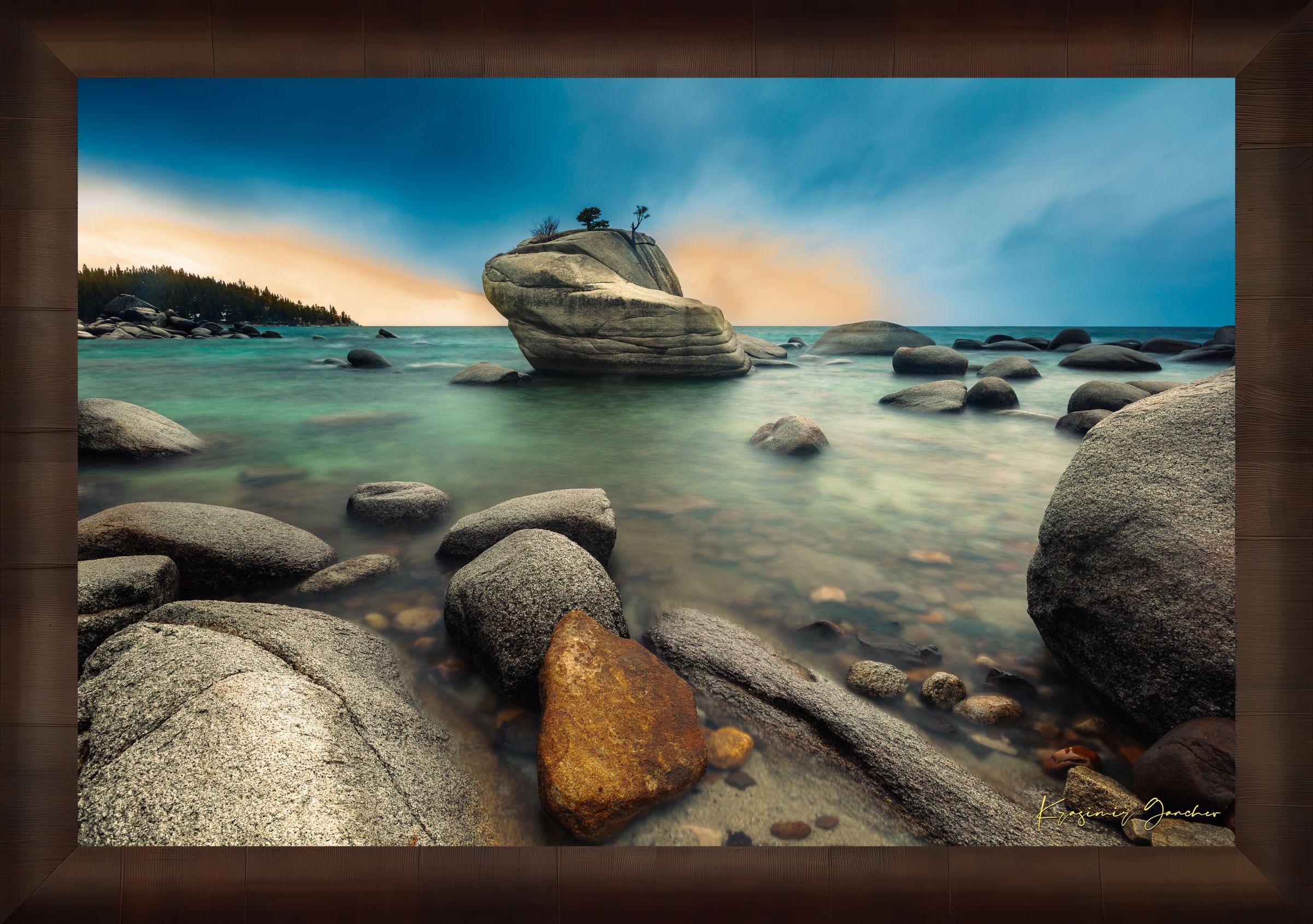 Bonsai Rock formation beside a calm lake in Lake Tahoe during sunset with gentle ripples and clouds. #Finish_Roma Cigar Leaf Frame