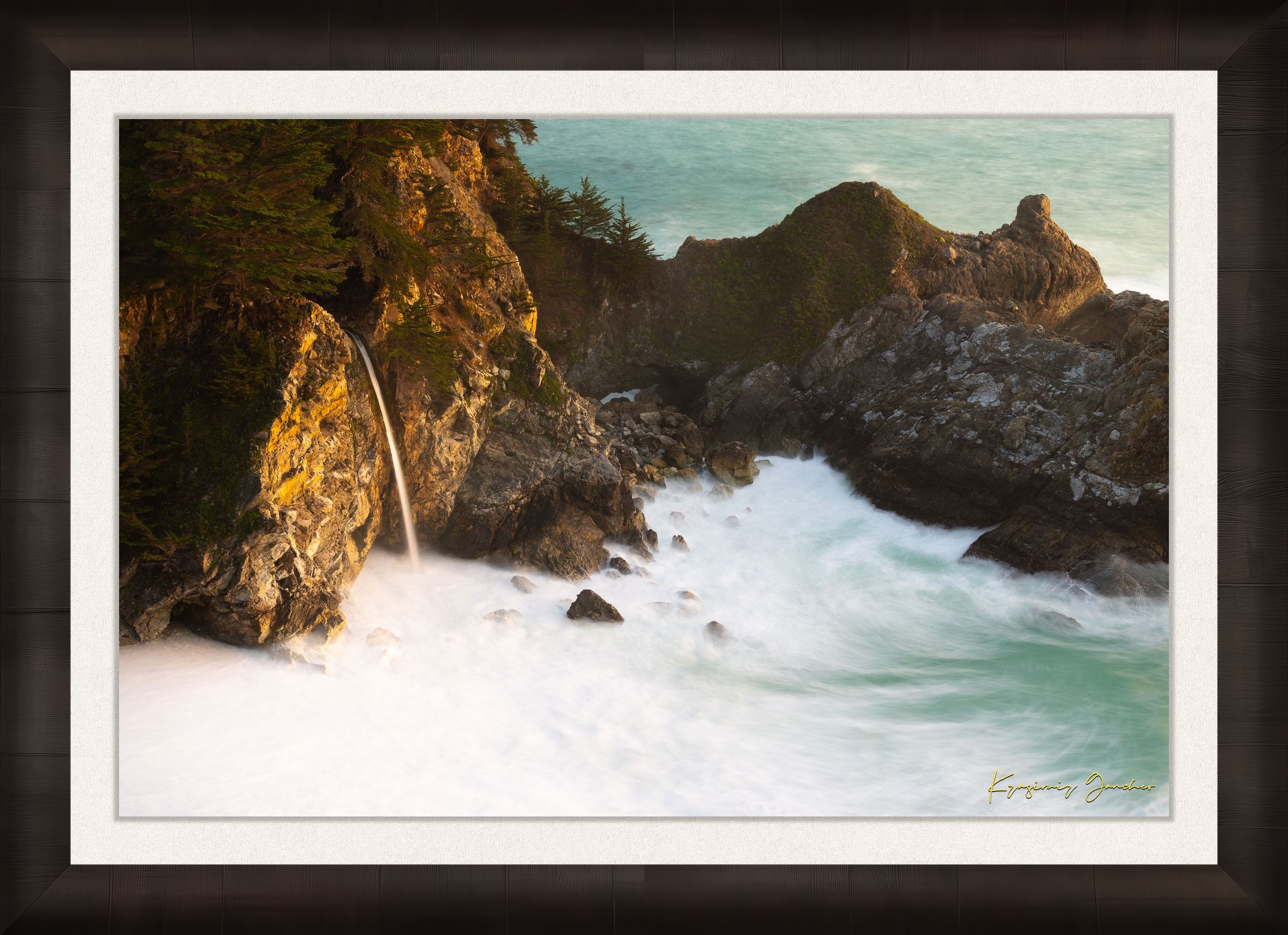 McWay Falls flows from a cliff onto a beach in Big Sur, captured during sunset with the Pacific Ocean visible. #Finish_Roma Dark Ash Frame & Bright Liner