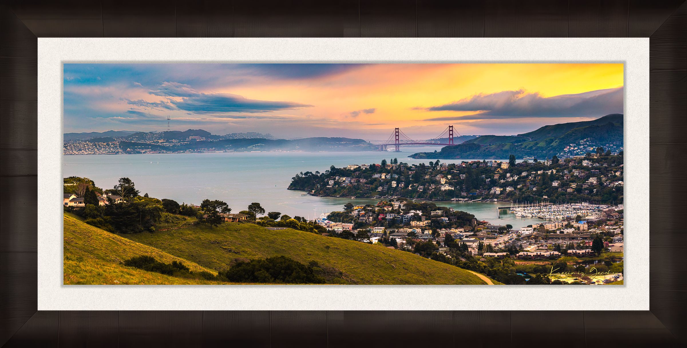 Golden Gate Bridge illuminated at sunset above the San Francisco Bay, showing light trails and cloudy skies with Tiburon in foreground. #Finish_Roma Dark Ash Frame & Bright Liner