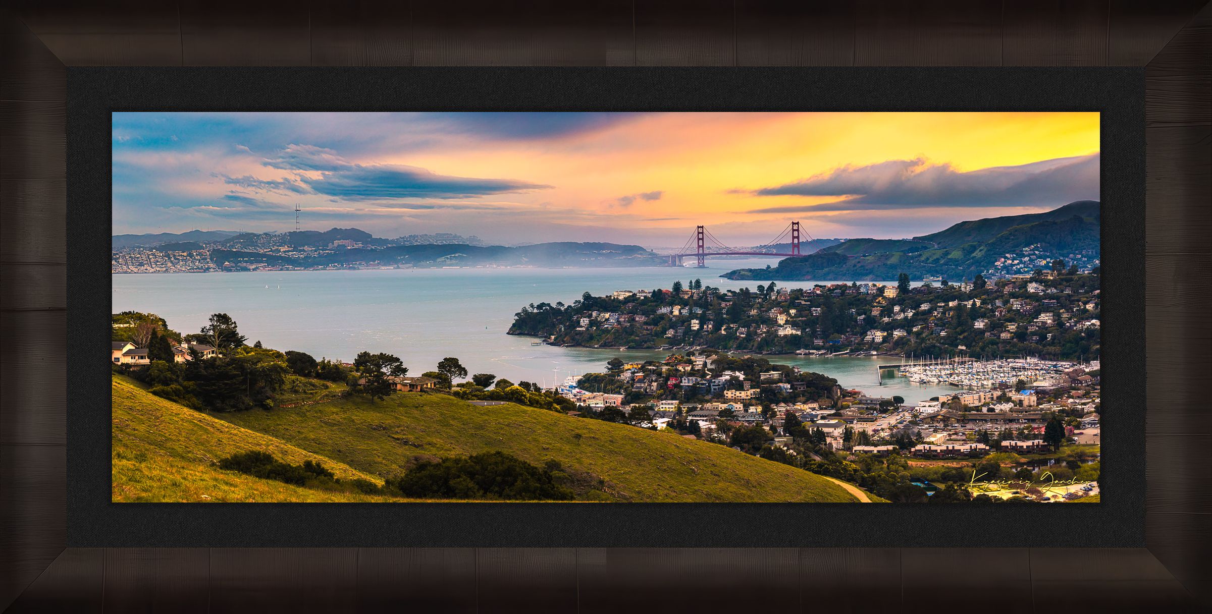Golden Gate Bridge illuminated at sunset above the San Francisco Bay, showing light trails and cloudy skies with Tiburon in foreground. #Finish_Roma Dark Ash Frame & Dark Liner