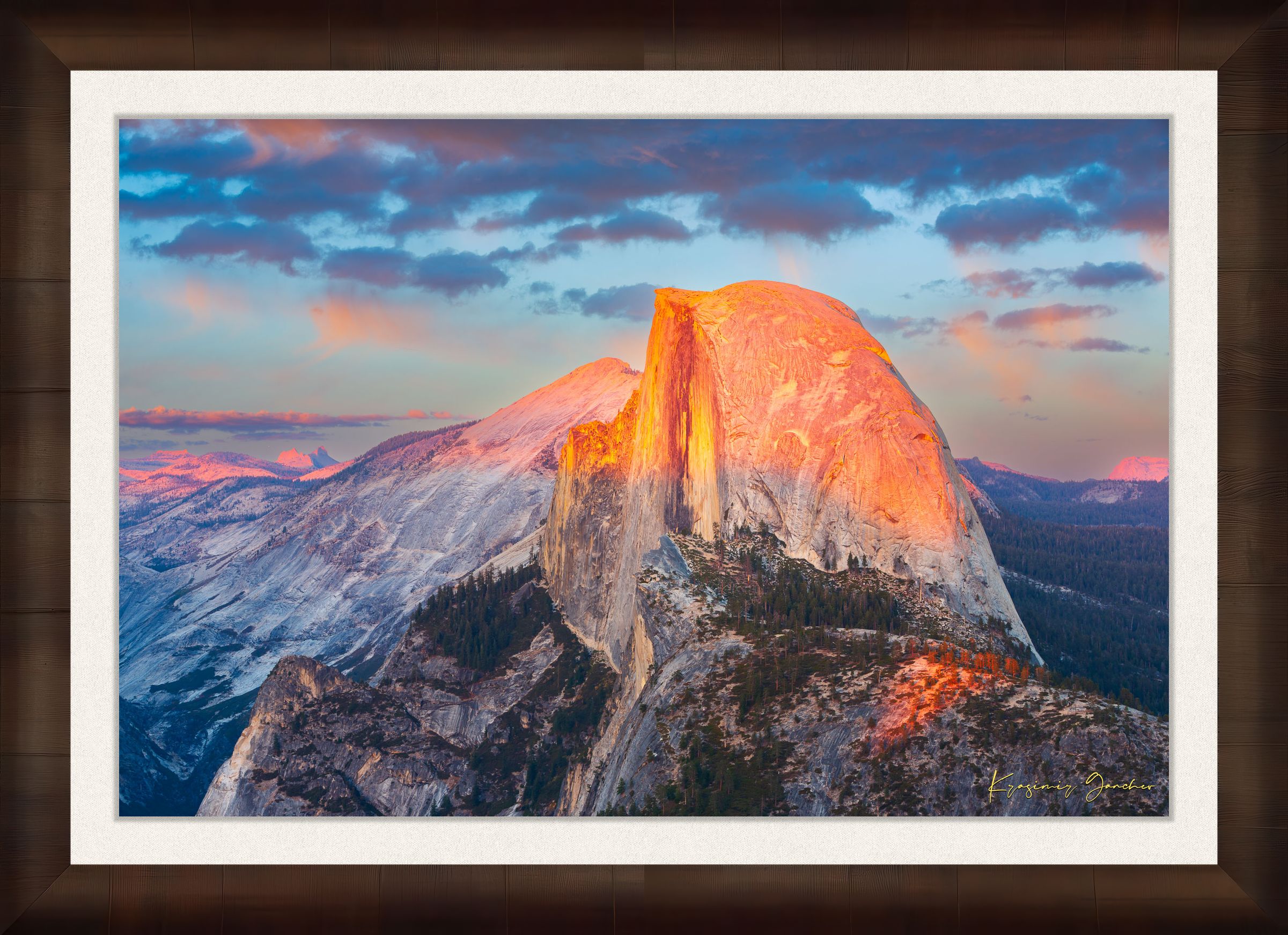 Monolith of Half Dome in Yosemite National Park illuminated by sunset light amid scattered clouds. #Finish_Roma Cigar Leaf Frame & Bright Liner