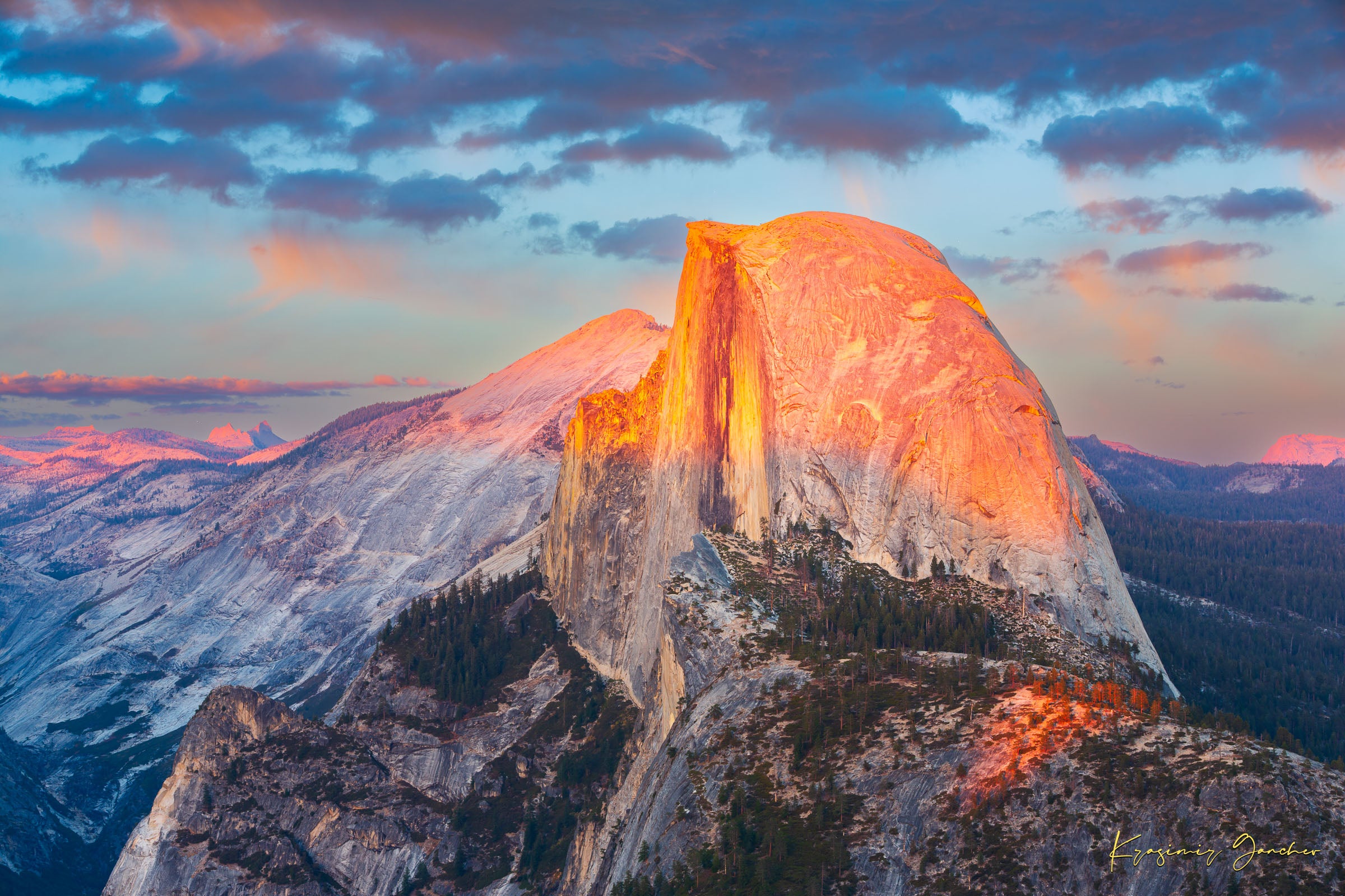 Monolith of Half Dome in Yosemite National Park illuminated by sunset light amid scattered clouds. #Finish_Acrylic Recess
