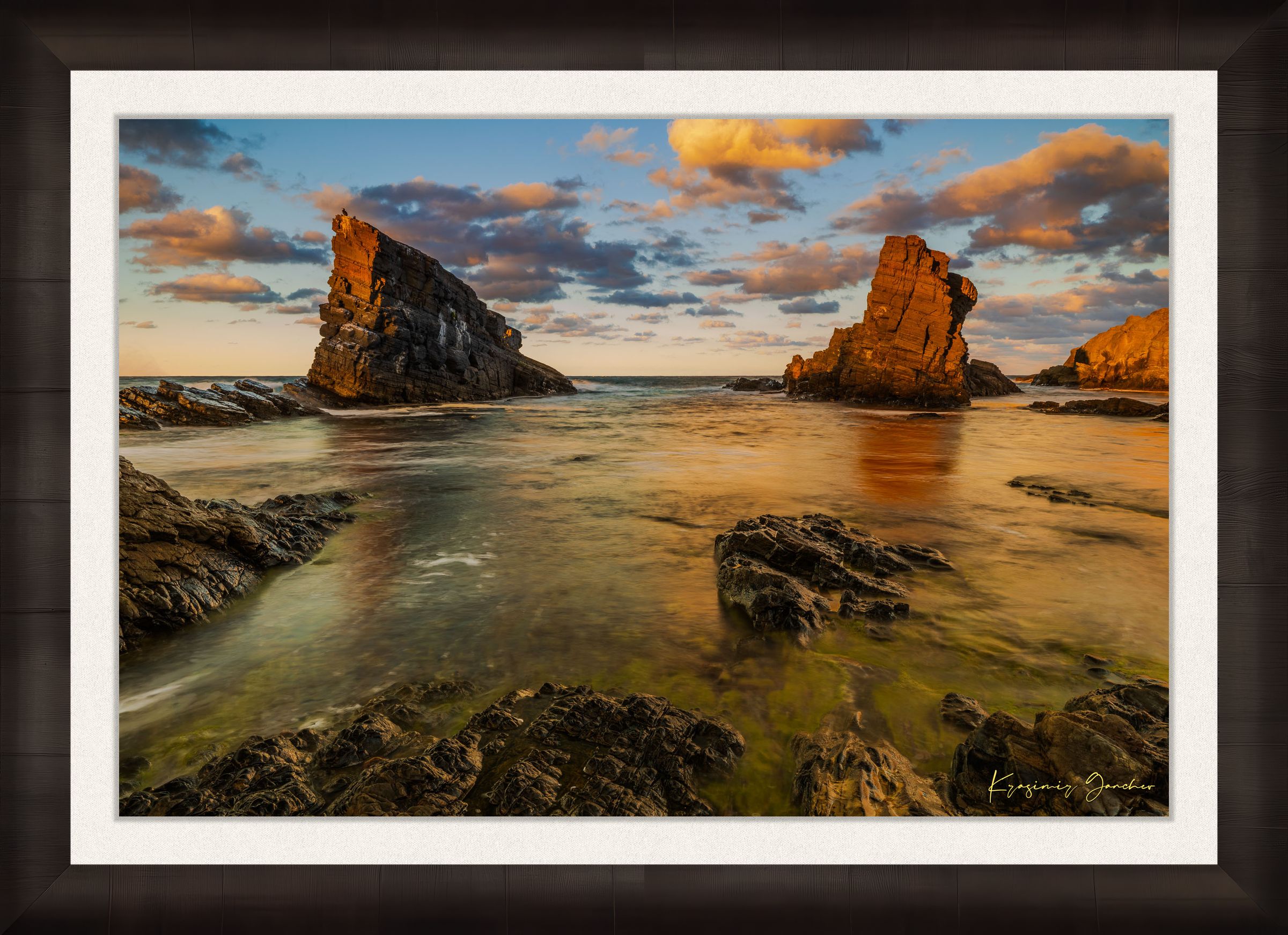 The Stone Ships boulders and sea stacks at Sinemorets, Bulgaria, illuminated by golden sunset light reflecting on calm sea waters. #Finish_Roma Dark Ash Frame & Bright Liner