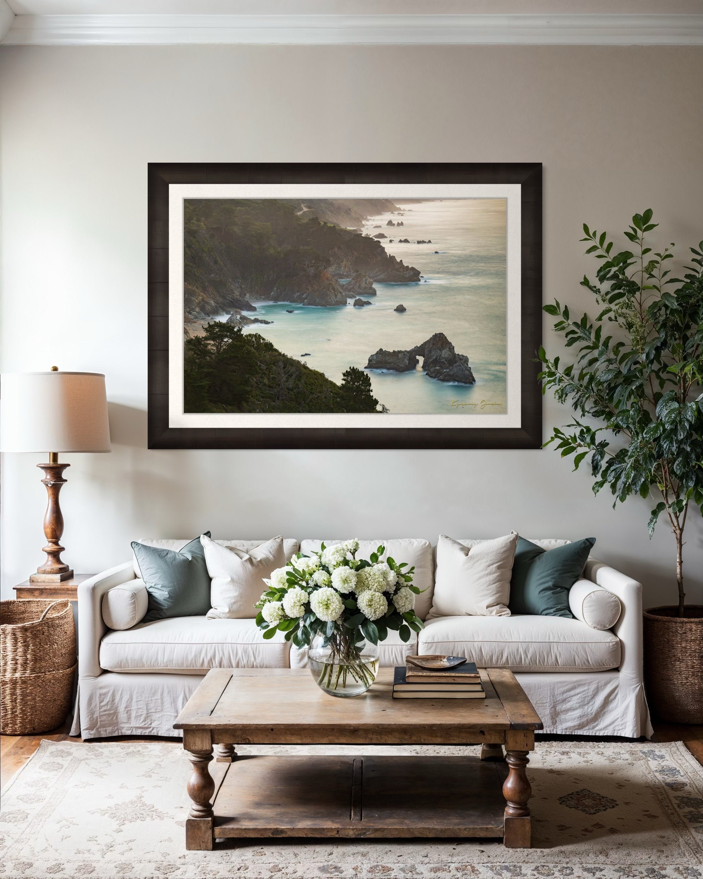 Coastal rock formation known as McWay Rocks at dawn on the Big Sur coastline with lush vegetation and ocean view. #Finish_Roma Dark Ash Frame & Bright Liner