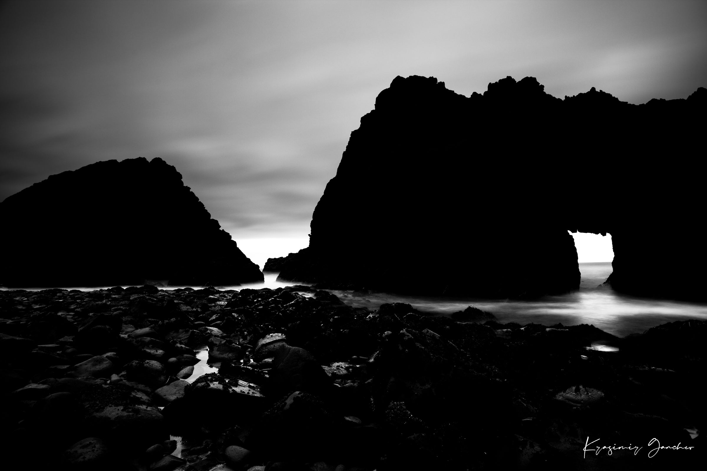 Silhouette of Keyhole Arch at Big Sur under dusky sky with cloud and wave detail. #Finish_Acrylic Recess