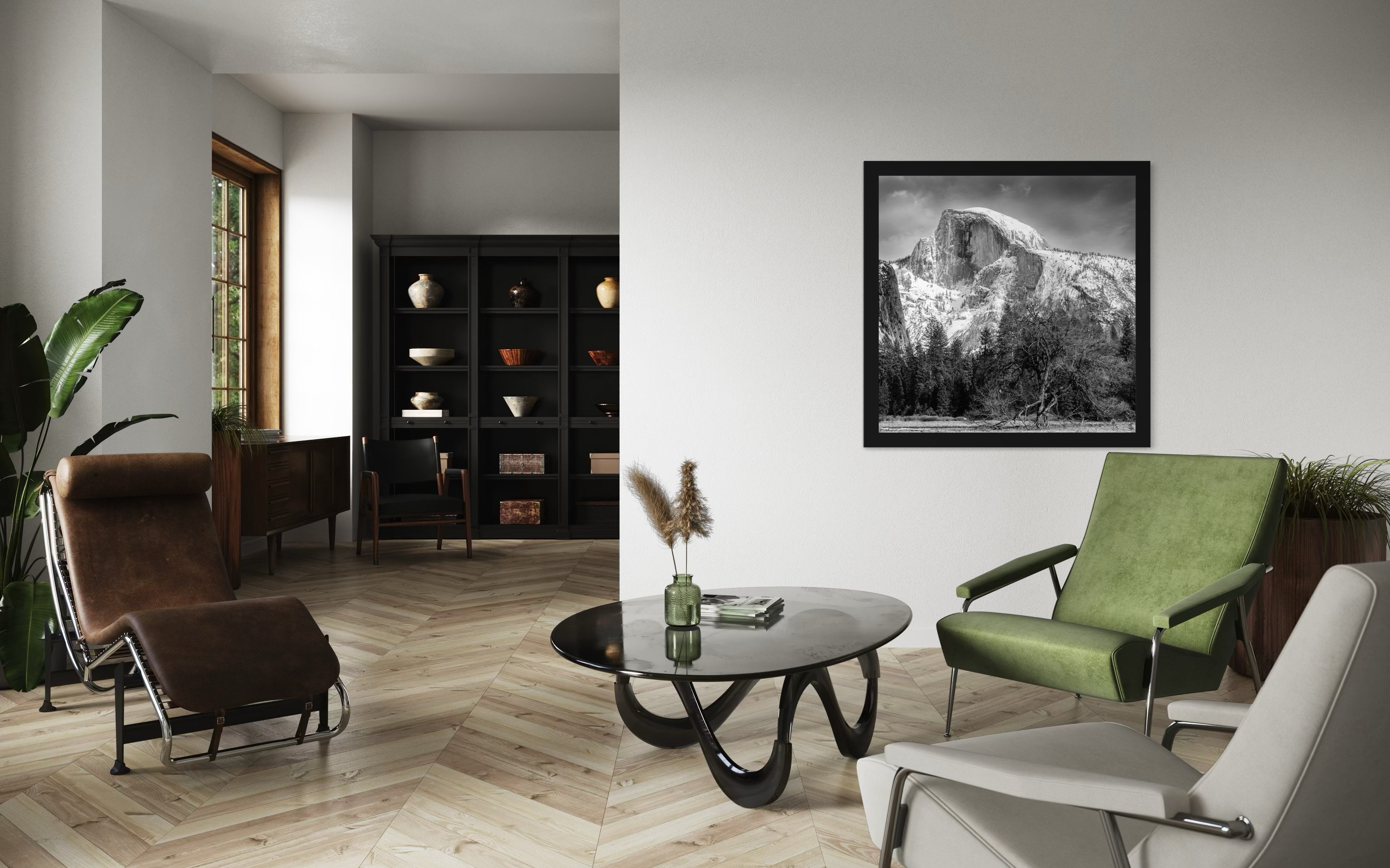 Monolithic Half Dome stands in stark contrast against a shadowed foreground amid clouds and fresh snow in Yosemite National Park. #Finish_Roma Satin Black Frame