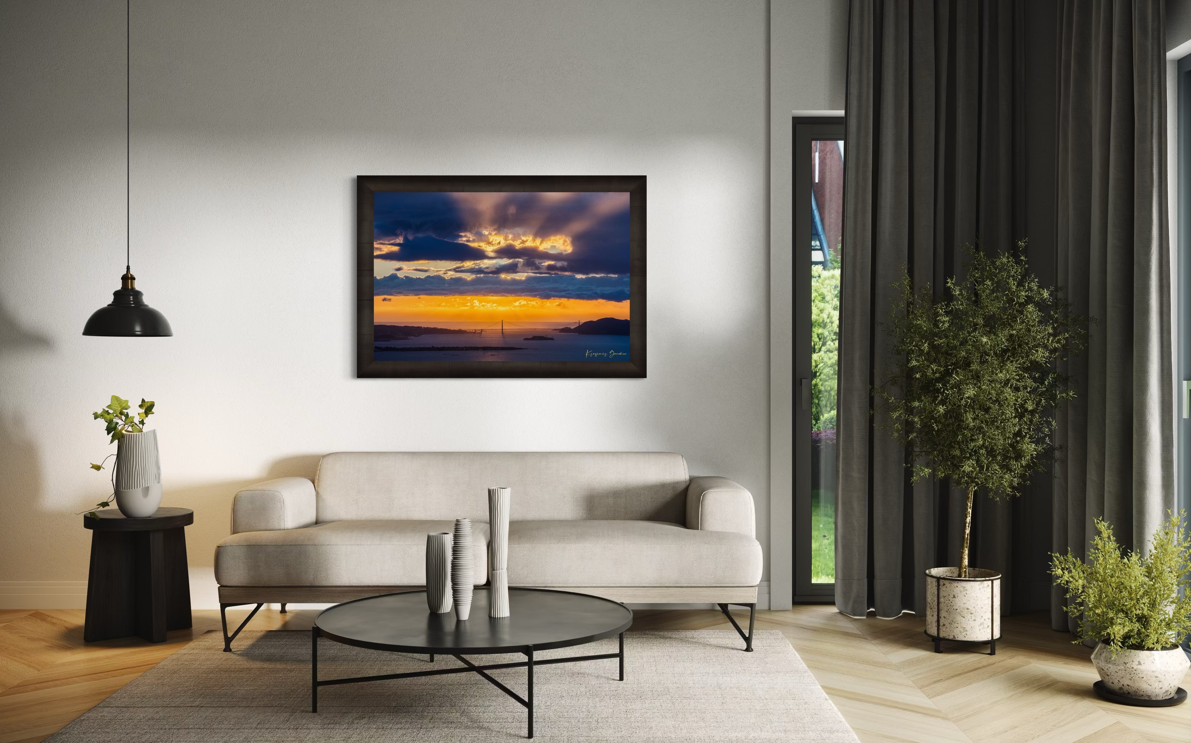 Golden Gate Bridge spanning a sunlit bay at sunset under layered stormy clouds, warm hues blending into cool sky tones. #Finish_Roma Dark Ash Frame