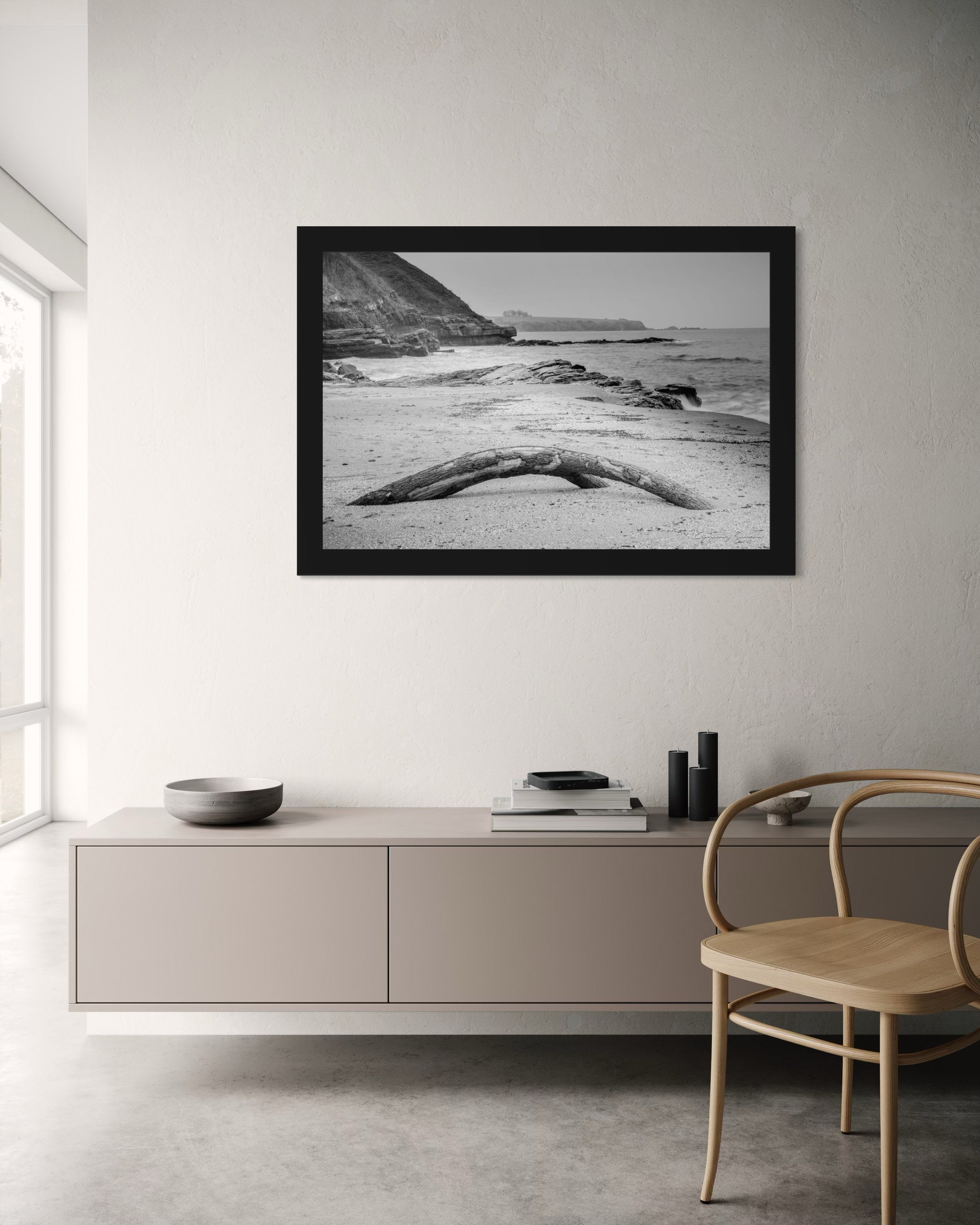 Weathered driftwood on Ahtopol beach along the Black Sea during daylight with haze. #Finish_Roma Satin Black Frame