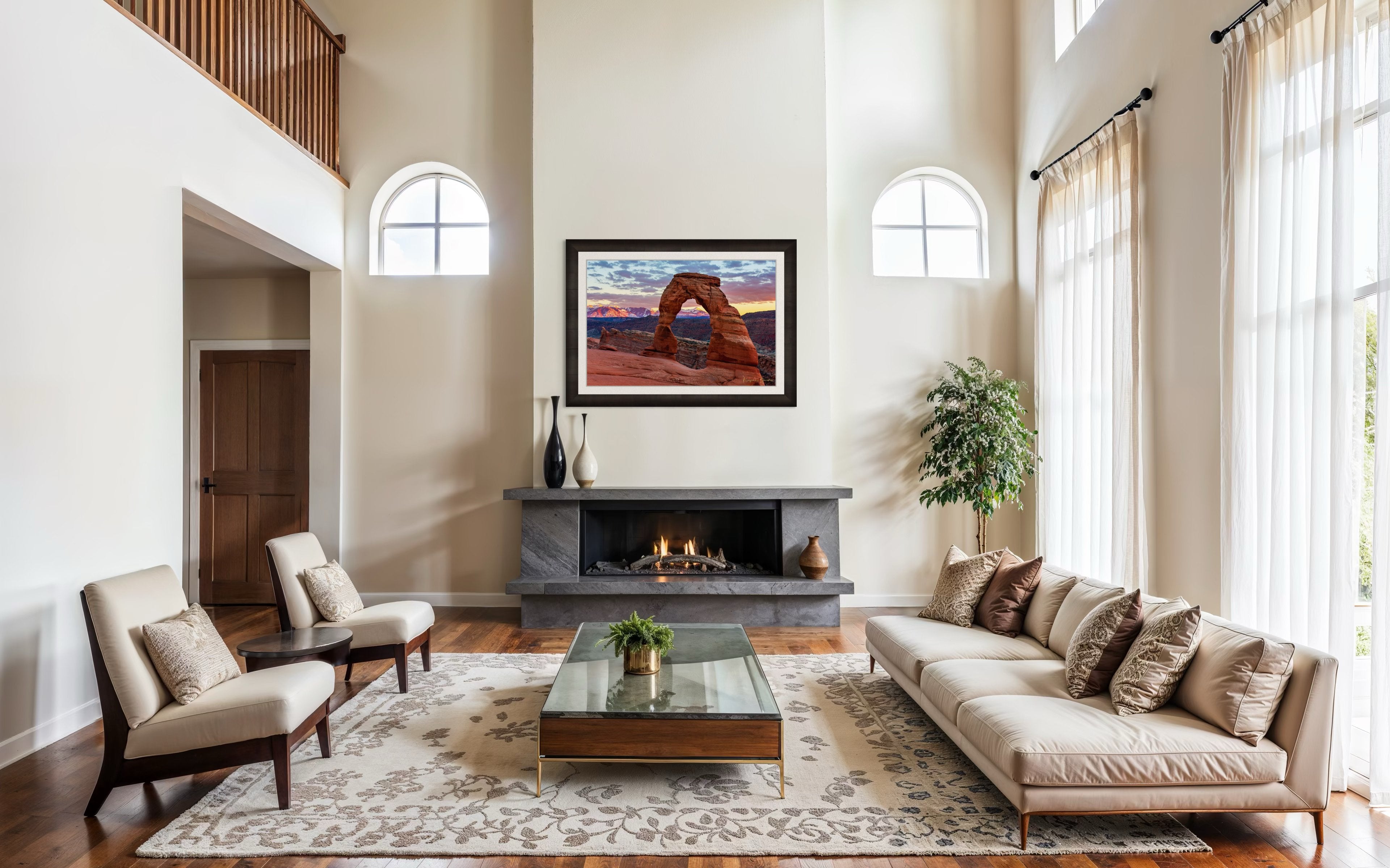 Natural arch of Delicate Arch in Arches National Park illuminated by sunset glow against a cloudy sky with vibrant reds and purples. #Finish_Roma Dark Ash Frame & Bright Liner