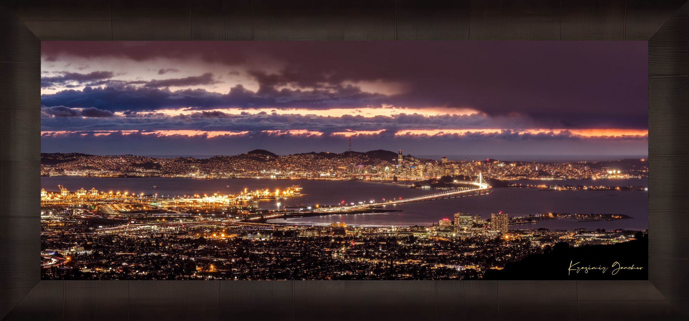 Landscape photograph of Golden Gate Bridge illuminated at night over San Francisco Bay under cloudy skies. #Finish_Roma Dark Ash Frame