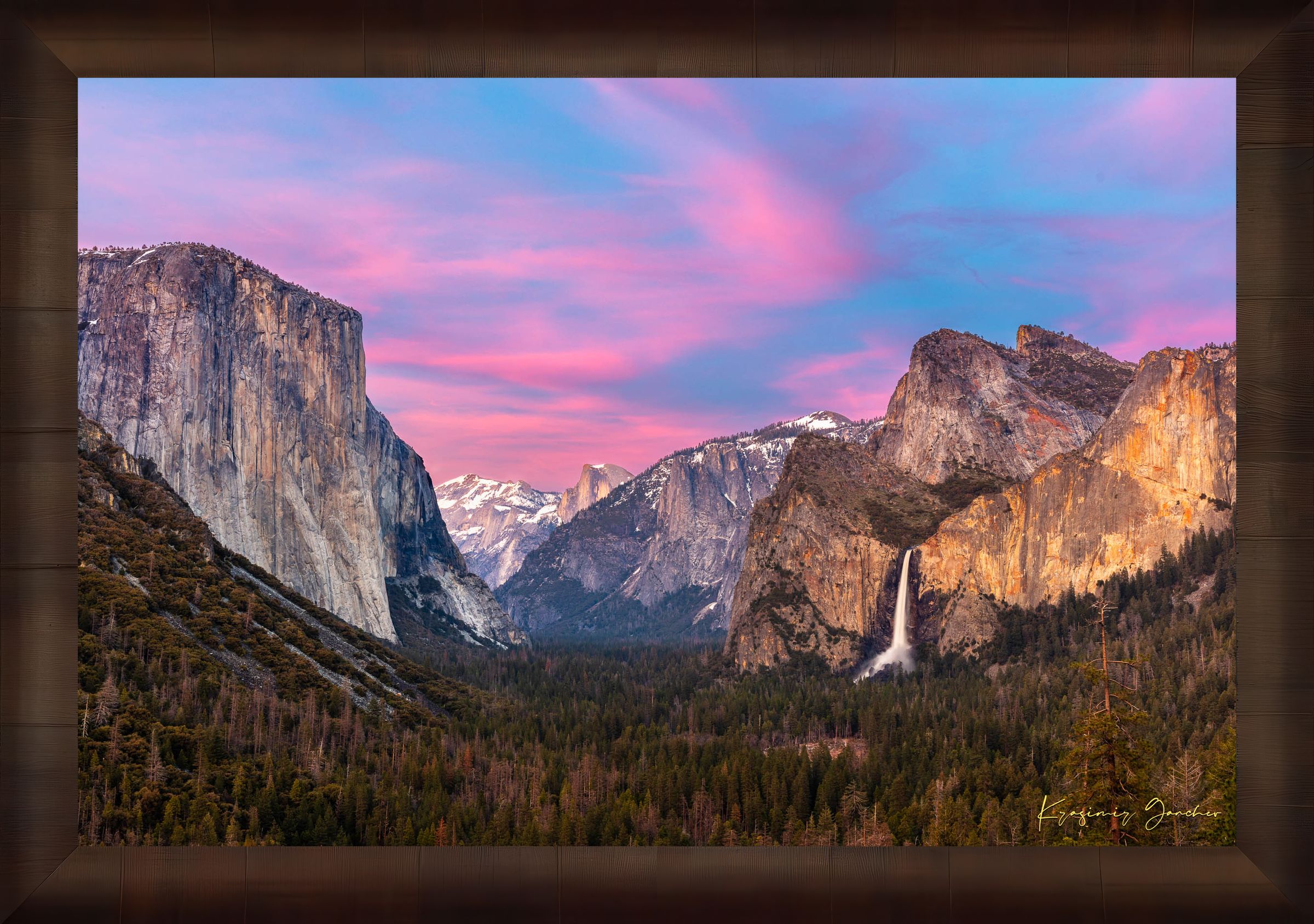 Yosemite Valley view of El Capitan monolith beneath snowy peaks, soft rose-lavender sky and cloud-covered horizon. #Finish_Roma Cigar Leaf Frame