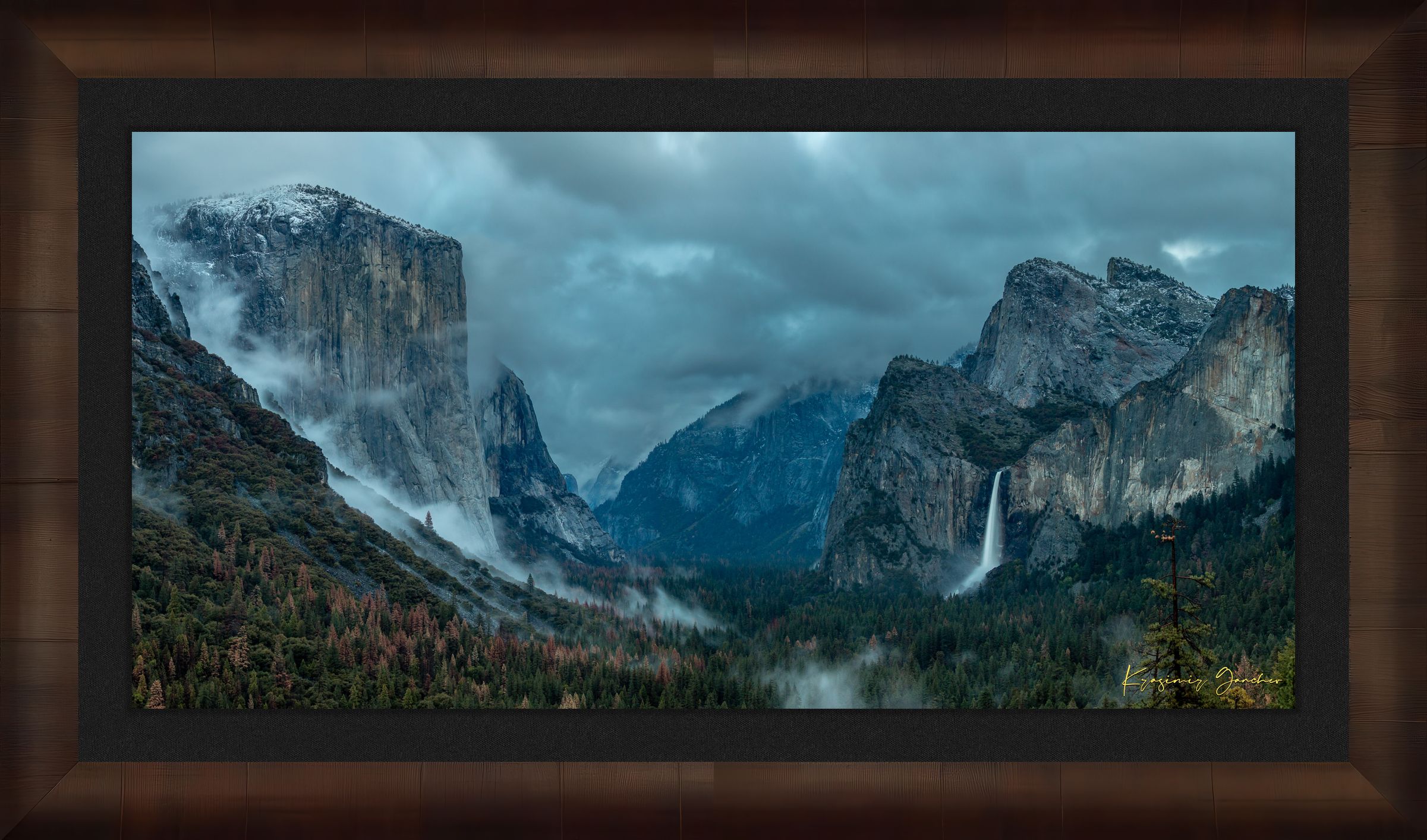 Bridalveil Falls surrounded by mist and clouds in Yosemite Valley during twilight, shadowed monoliths visible. #Finish_Roma Cigar Leaf Frame & Dark Liner