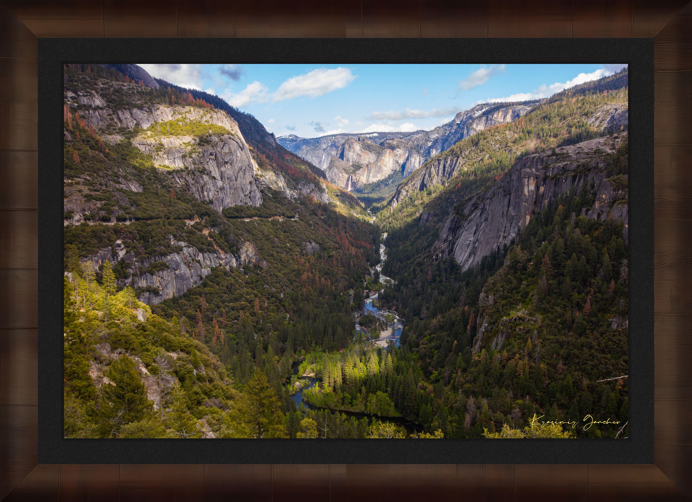 Merced River winding through a wooded valley in Yosemite National Park under daylight and soft evening sun with scattered clouds. #Finish_Roma Cigar Leaf Frame & Dark Liner