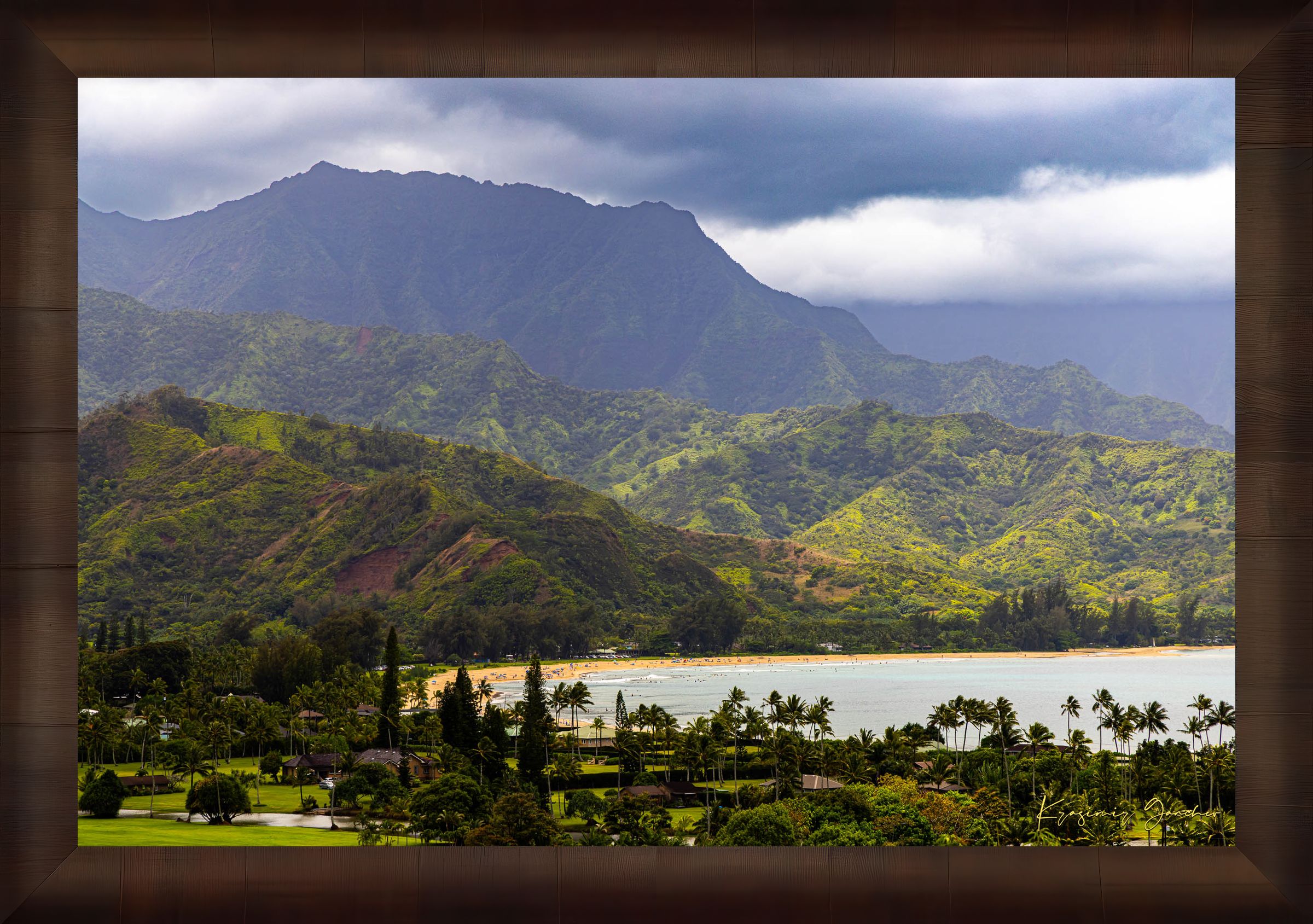Ocean view of Hanalei Bay on Kauai's coast with lush hills and distant cloud-covered peaks. #Finish_Roma Cigar Leaf Frame