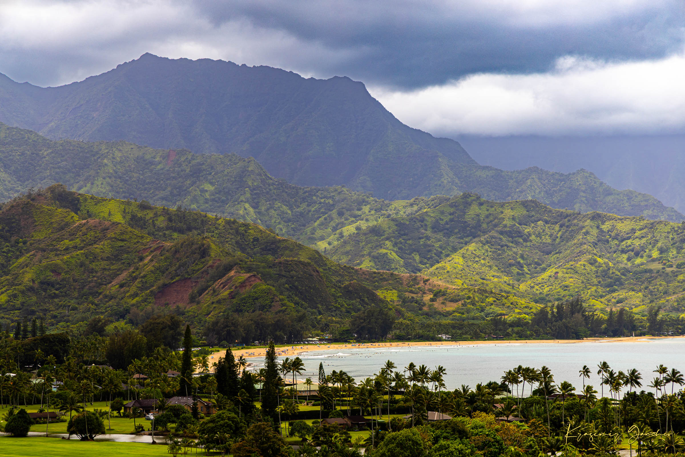 Ocean view of Hanalei Bay on Kauai's coast with lush hills and distant cloud-covered peaks. #Finish_Acrylic Recess