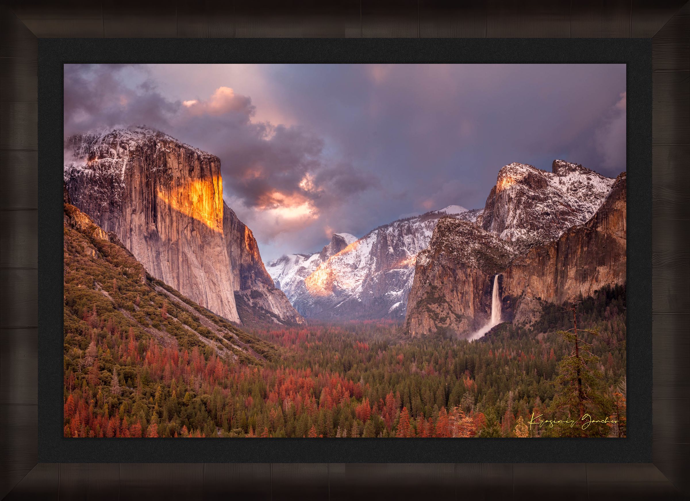 Granite monolith El Capitan rises above Yosemite Valley at golden hour, with snowy peaks and falling waterfall. #Finish_Roma Dark Ash Frame & Dark Liner