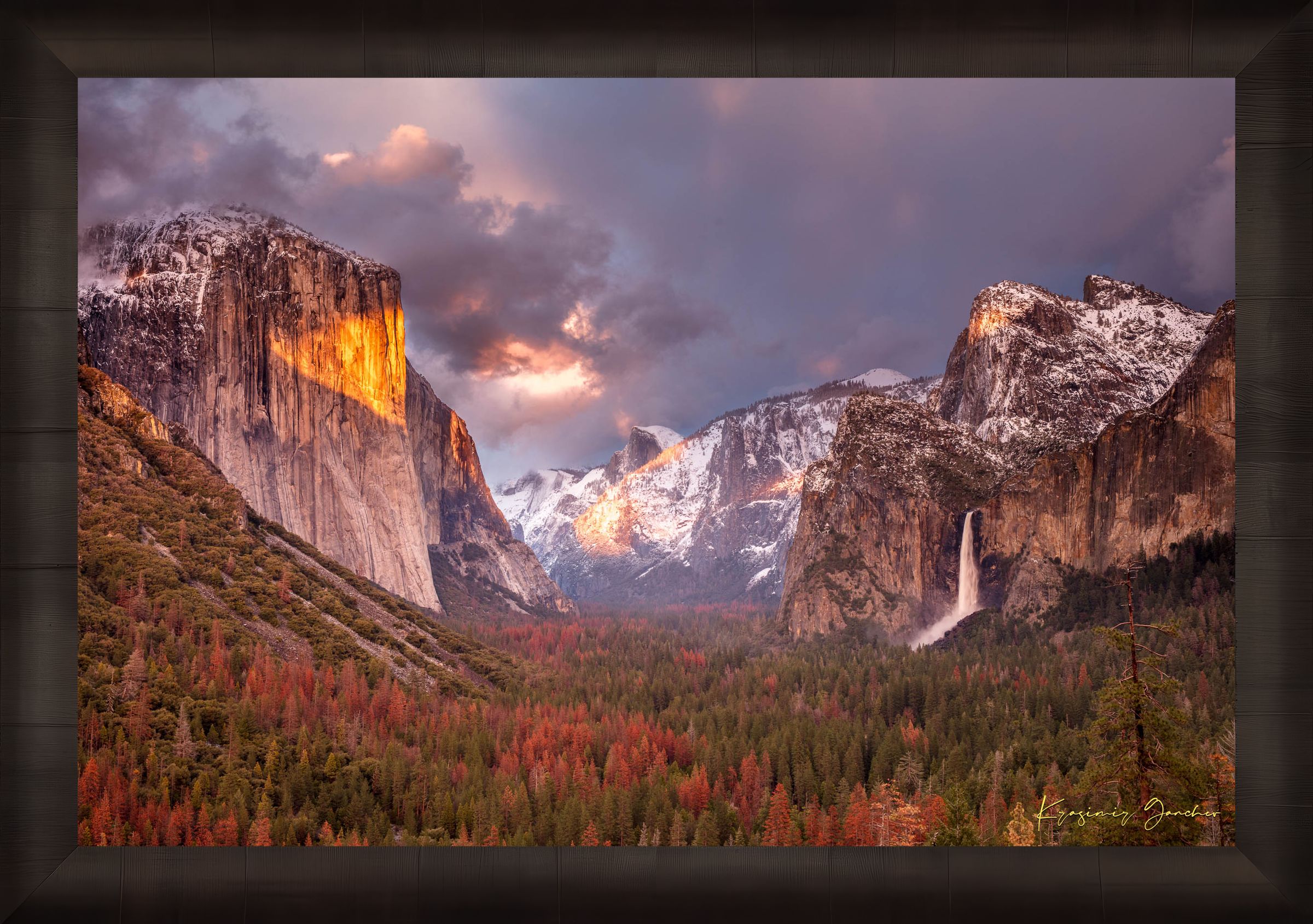Granite monolith El Capitan rises above Yosemite Valley at golden hour, with snowy peaks and falling waterfall. #Finish_Roma Dark Ash Frame