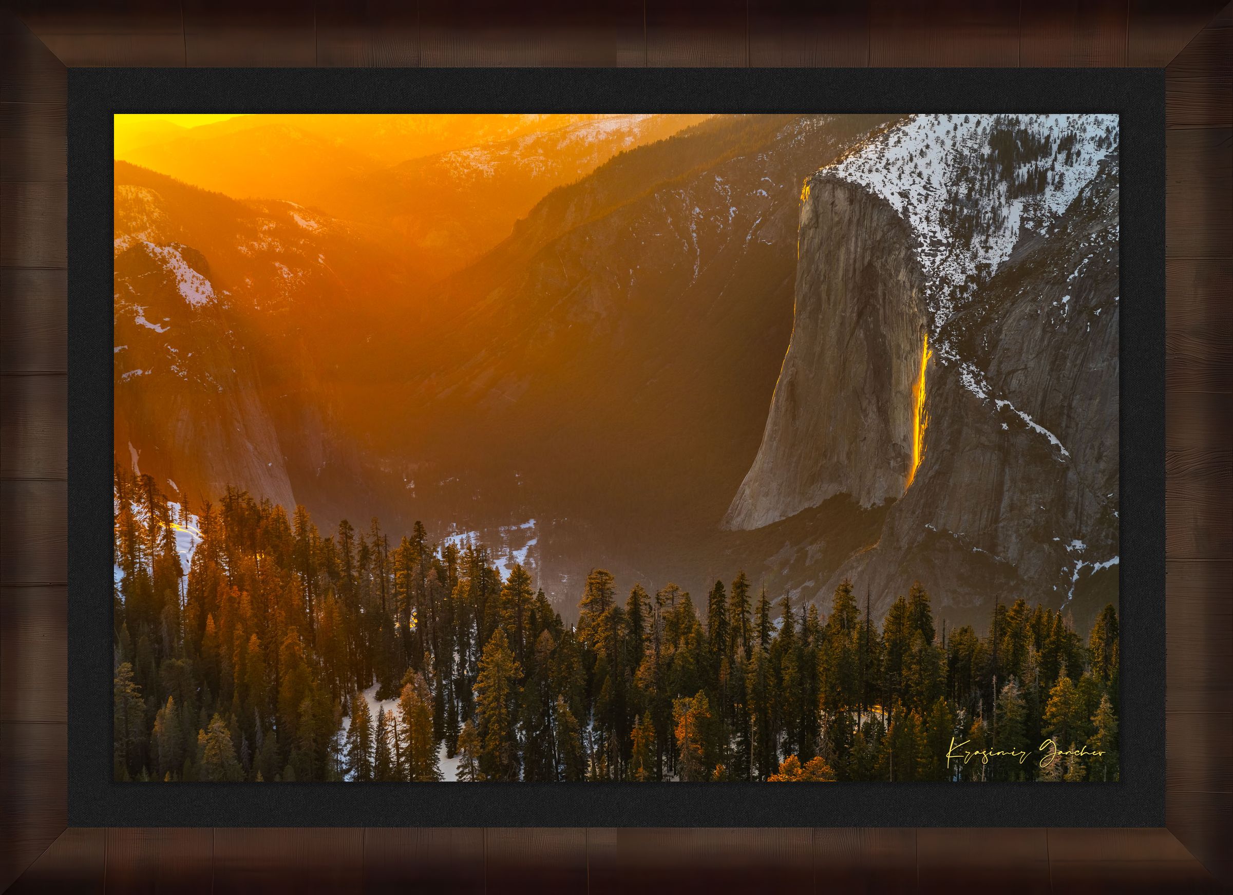 El Capitan illuminated by firefall light as a waterfall glows orange in Yosemite Valley. #Finish_Roma Cigar Leaf Frame & Dark Liner