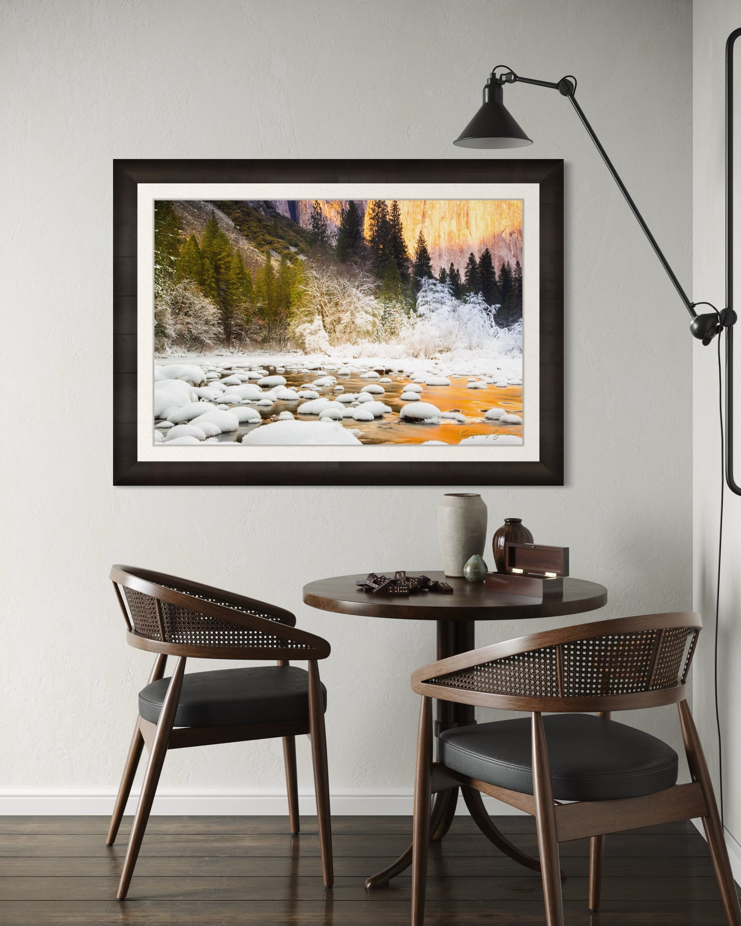 Merced River flowing through Yosemite National Park during sunset with golden light reflecting on snowy granite rock faces. #Finish_Roma Dark Ash Frame & Bright Liner