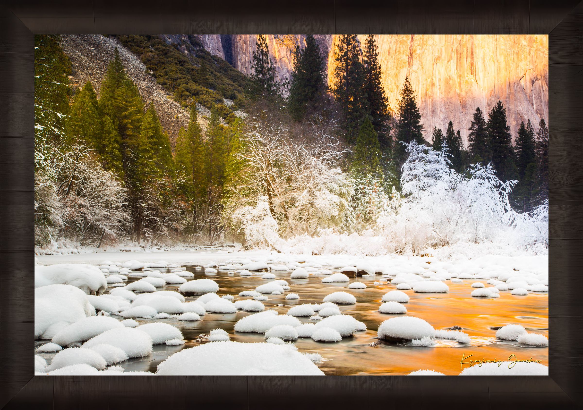 Merced River flowing through Yosemite National Park during sunset with golden light reflecting on snowy granite rock faces. #Finish_Roma Dark Ash Frame