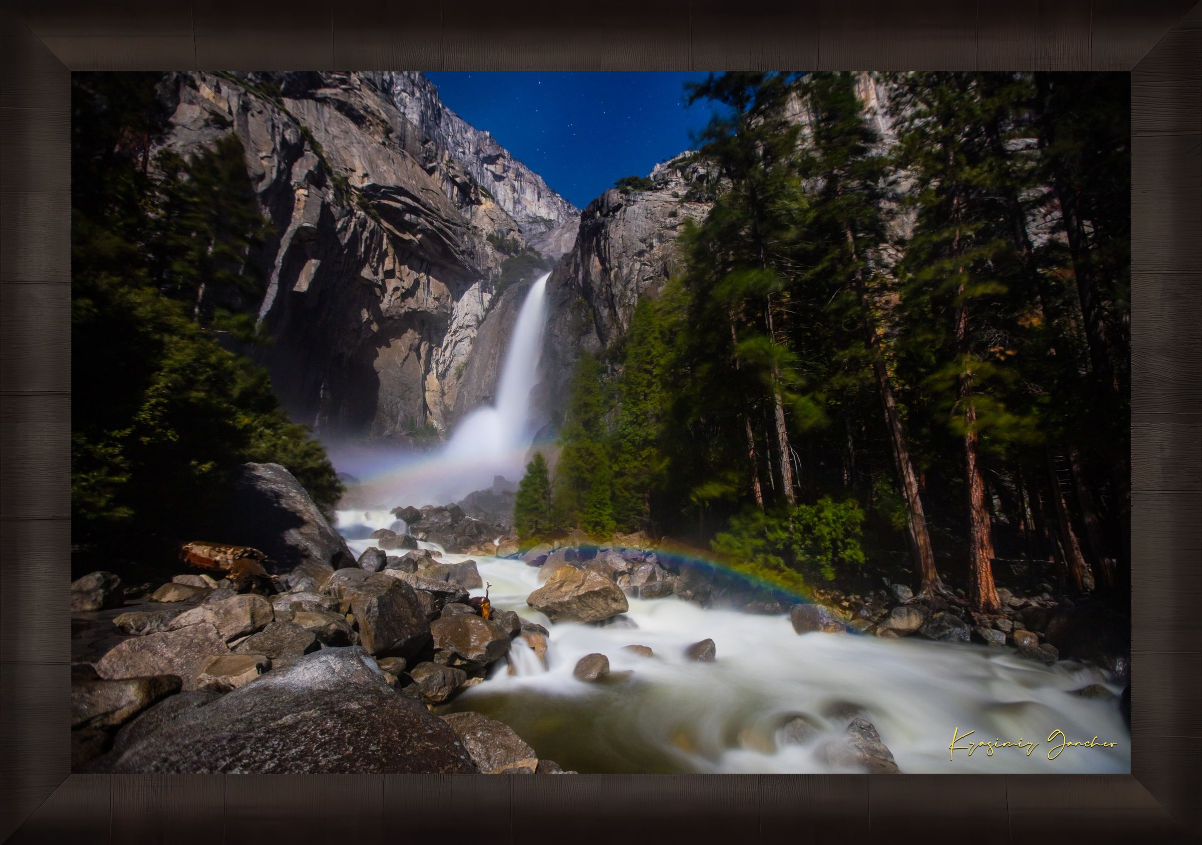 Yosemite Falls illuminated by starlight and an arc of moonbow, long exposure capturing flowing water against a clouded sky. #Finish_Roma Dark Ash Frame